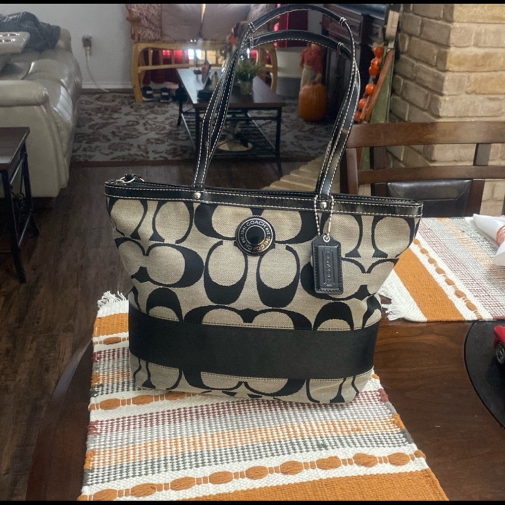 Coach classic fabric, gray with black leather trim.